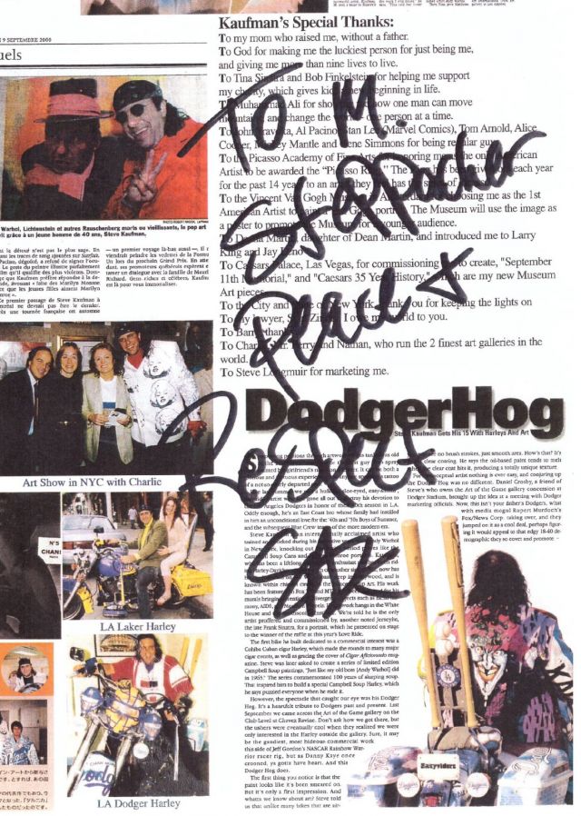 SAK newspaper article signed for Martin. ©Steve Kaufman Art Licensing LLC