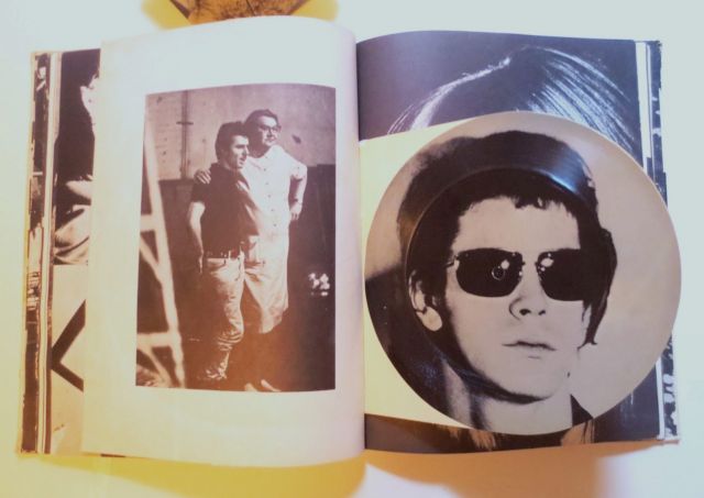 ANDY WARHOL, Andy Warhol’s Index Book (Random House, 1967), opened to the spread where a flexi-disc by The Velvet Underground (picturing Lou Reed’s face) is attached