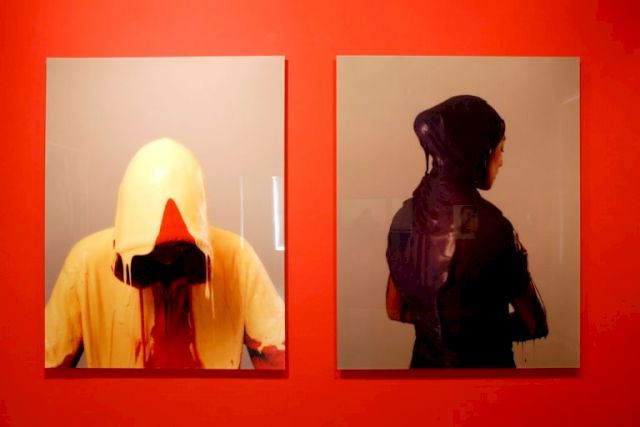 (L-R) HANNU KARJALAINEN, Man in Red Sweatshirt 2, 2009; Woman with Purple Scarf, 2009. Photo: Marianne Obst