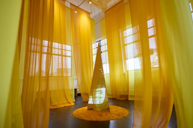 Kumari Nahappan, Monument, 1996/2023, Fabric, tumeric powder, mirror, Dimensions variable. Photo: Courtesy of The Private Museum, Singapore