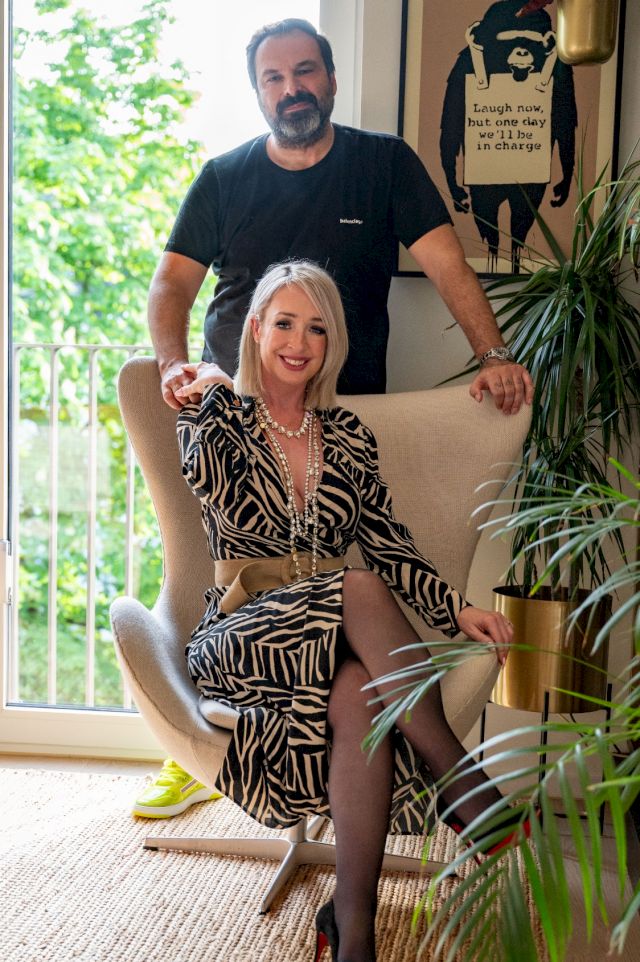 Andrew & Julia Jovic, in front of a limited Banksy. Photo: Christophe François Nilles